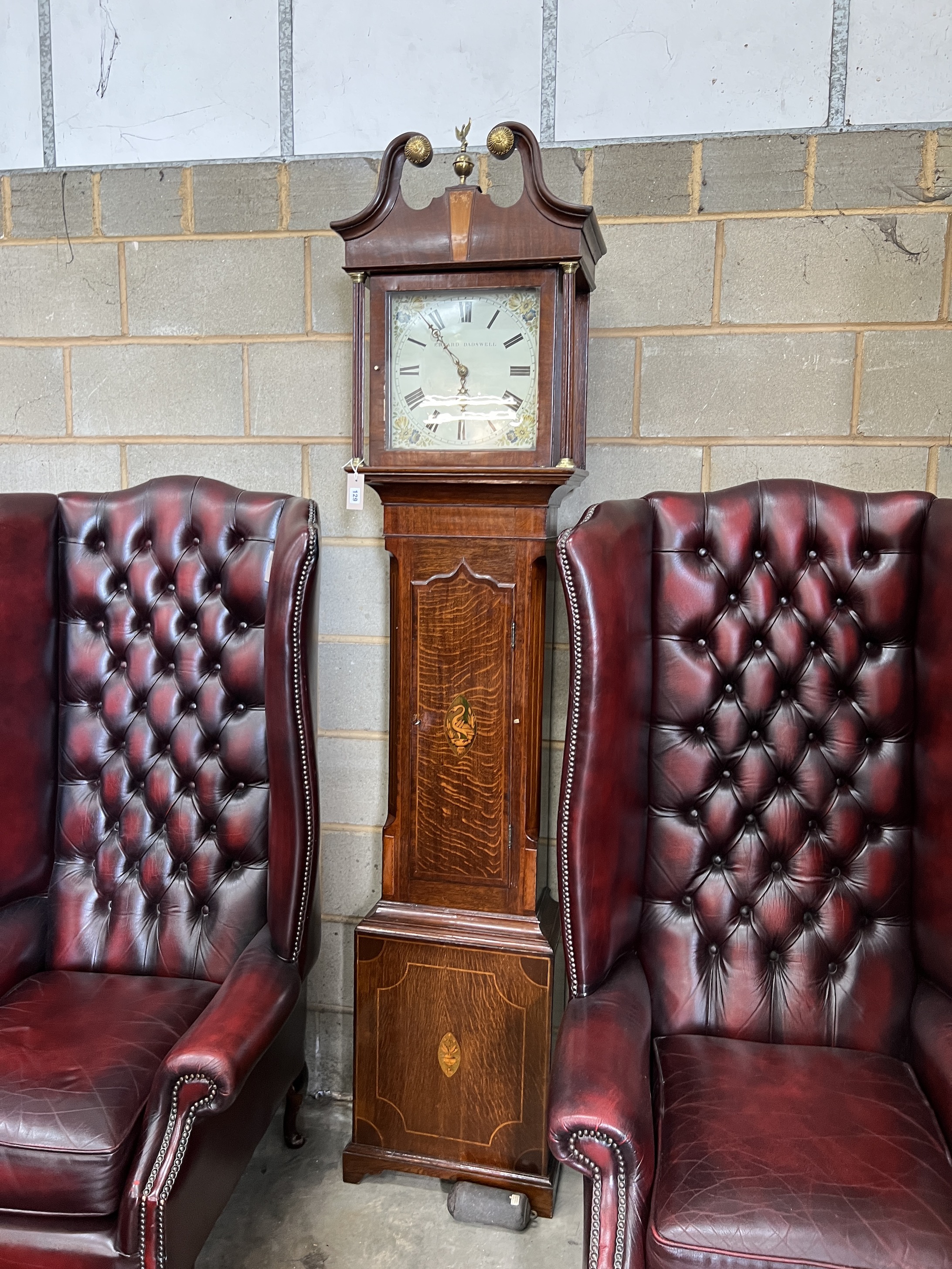 An early 19th century inlaid oak thirty hour longcase clock, the painted dial marked Edward Dadswell, Eastbourne, height 220cm
